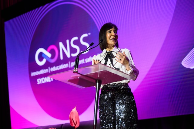 Dr Giulia D'Anna speaking at the Non-Surgical Symposium 2026