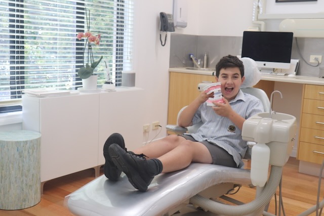 Child attending a dental appointment at iDental